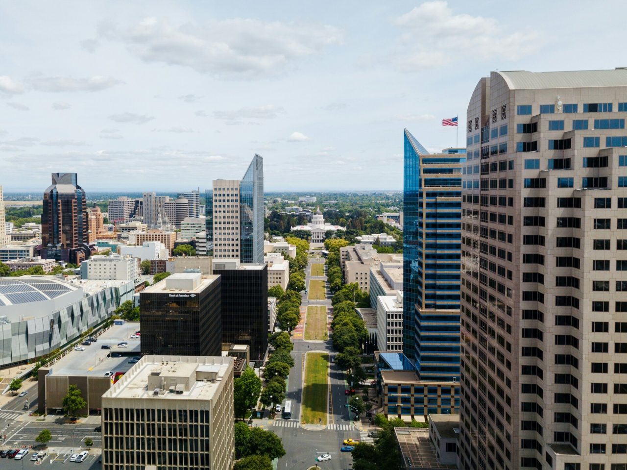 A sprawling city skyline filled with modern skyscrapers and tall buildings.